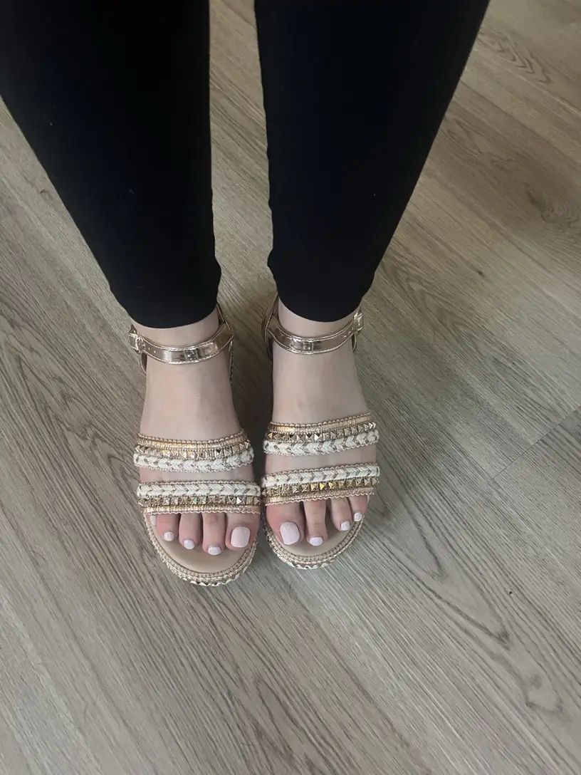 Happy customer showing her newly bought Fiona Boutique sandals