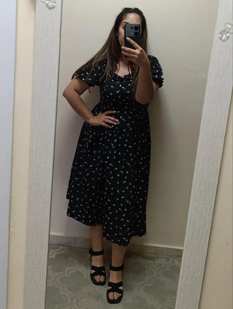 Happy customer showing her newly bought Fiona Boutique outfit