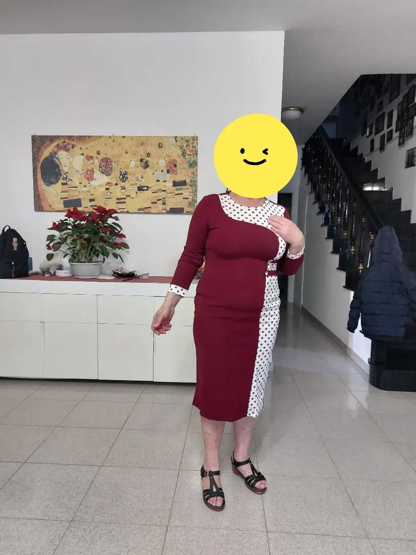 Lovely customer showing her recently bought clothing from Fiona Boutique